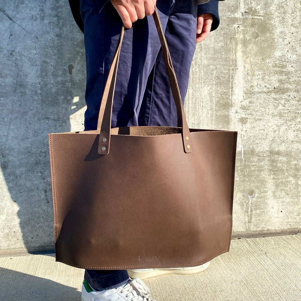 
                  
                    The Square Tote
                  
                