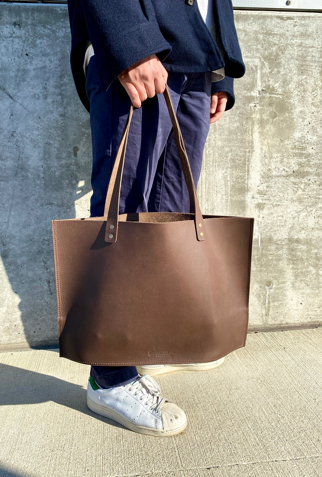 
                  
                    The Square Tote
                  
                