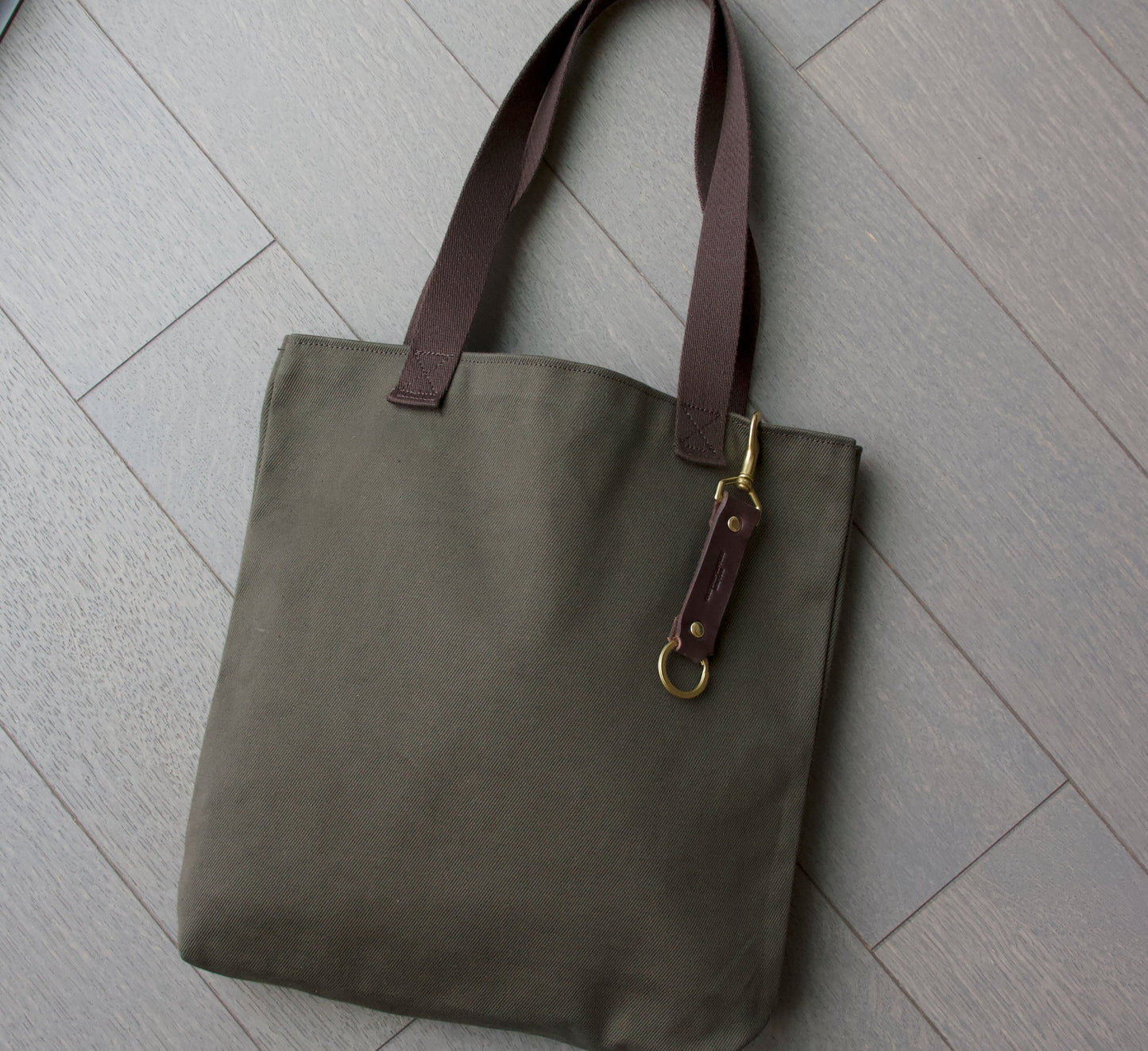 
                  
                    The Waxed Tote
                  
                