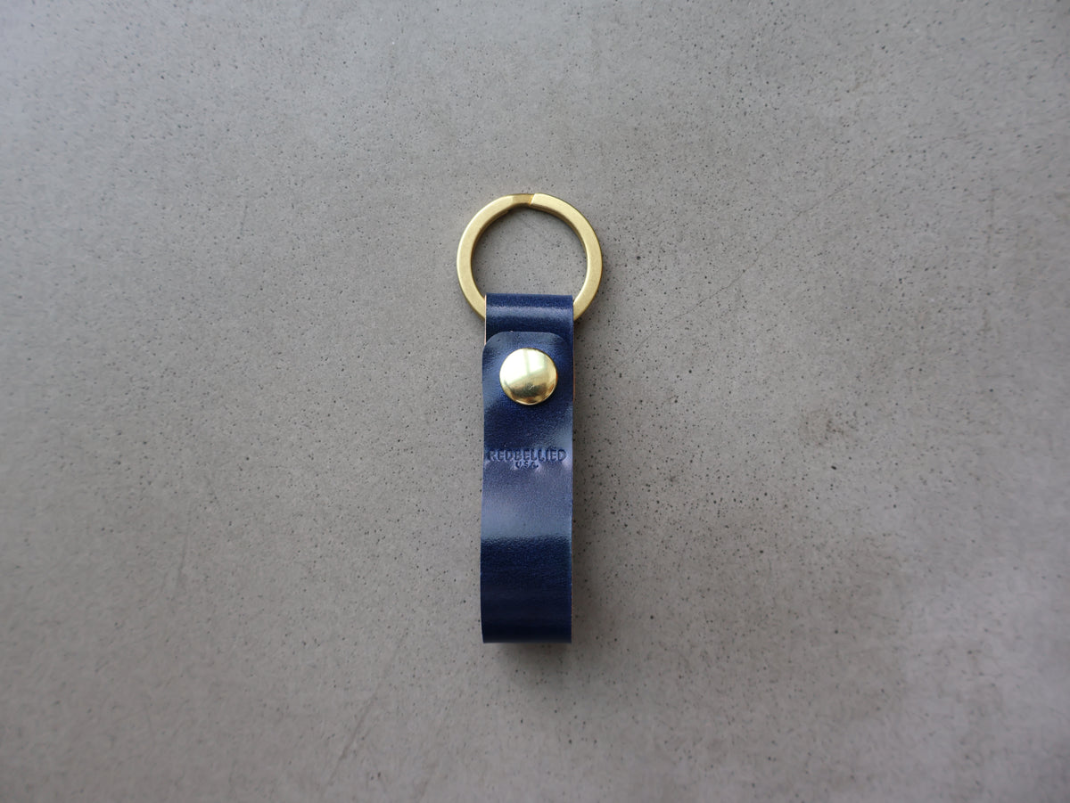 
                  
                    The Cordovan Keychain - Blue
                  
                