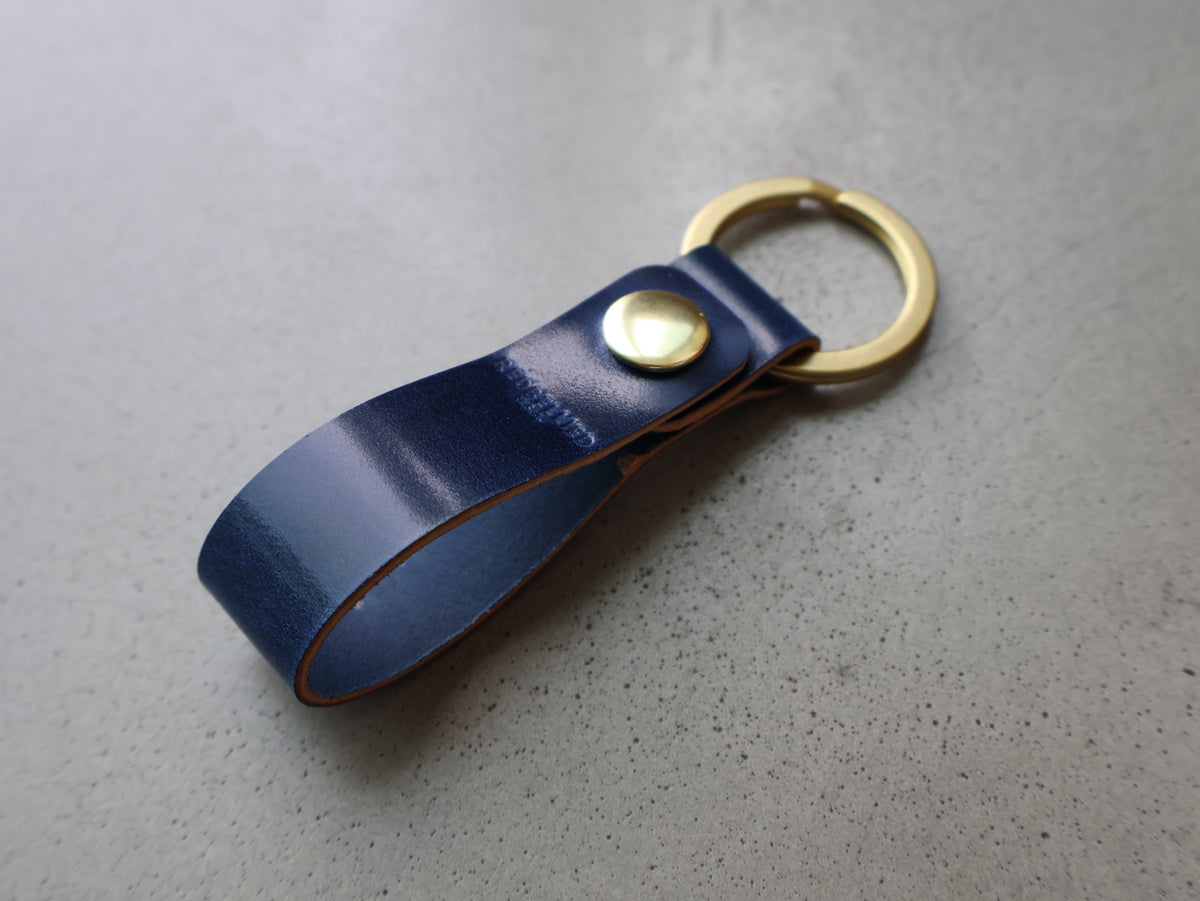 
                  
                    The Cordovan Keychain - Blue
                  
                
