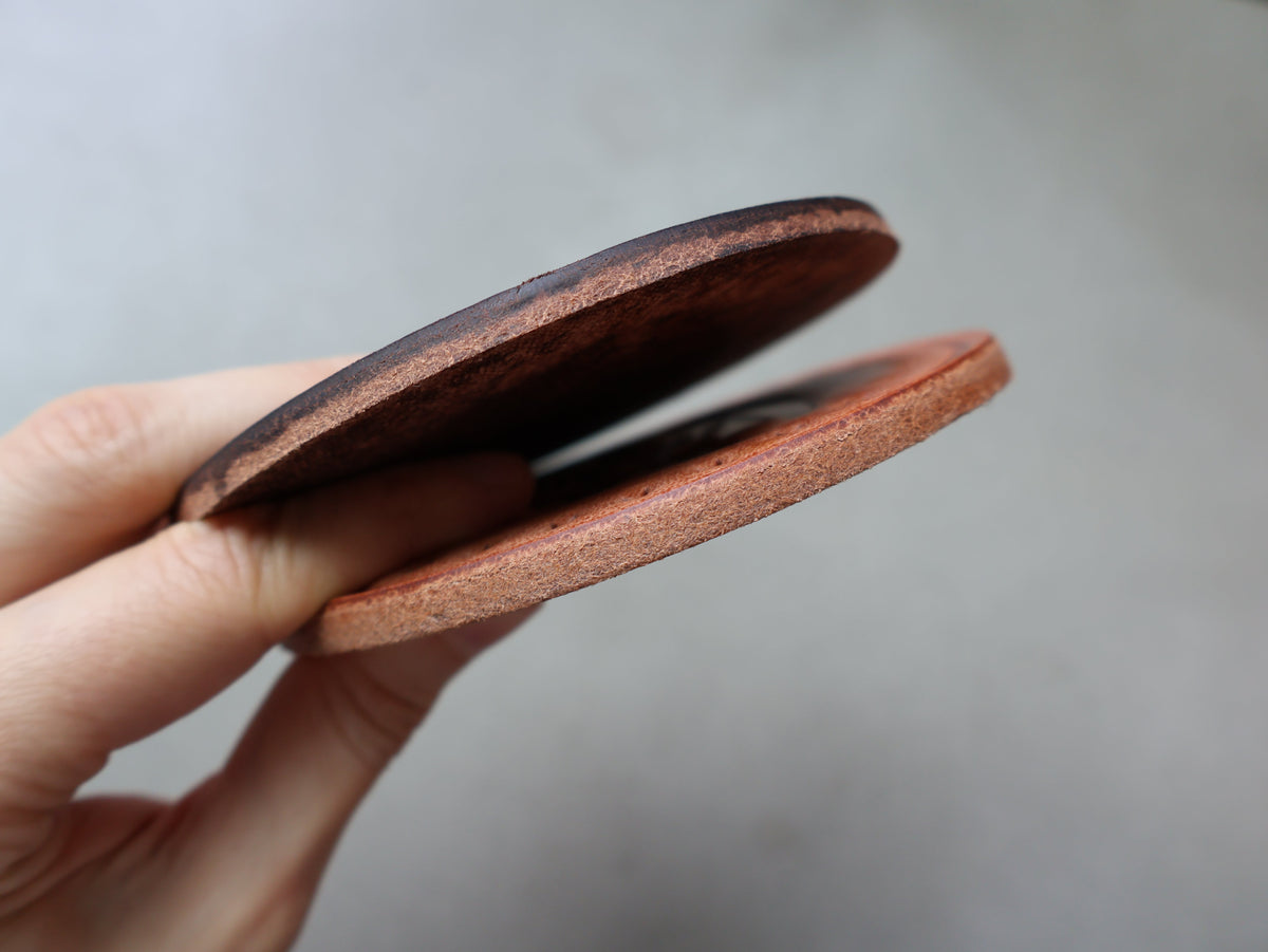 
                  
                    Hermann Oak Bald Eagle Leather Coasters
                  
                