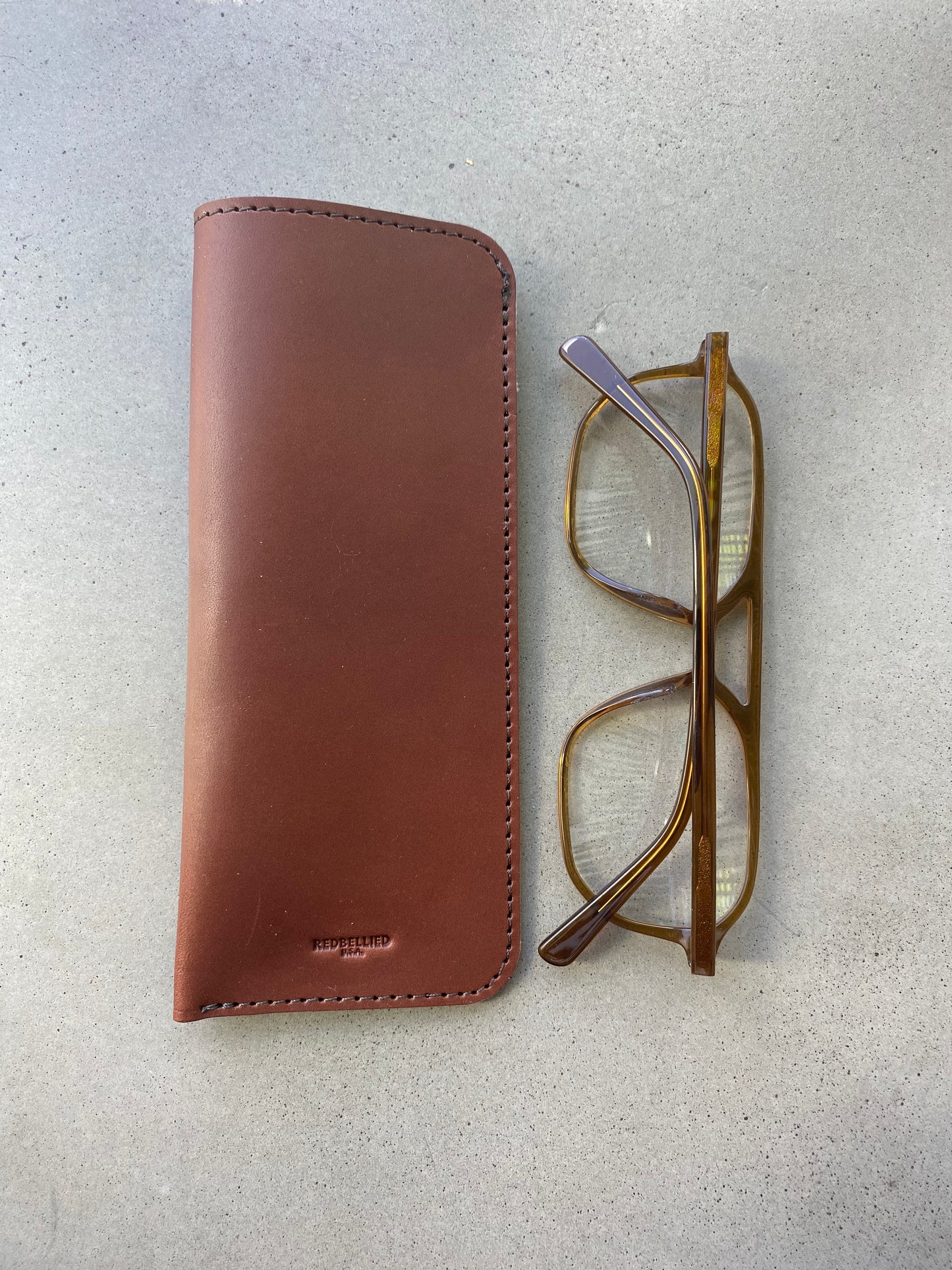 
                  
                    The Leather Eyeglass Case
                  
                